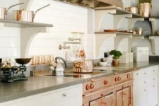 26 a vintage-inspired copper cooker takes over the space, and stainless steel touches contrast it