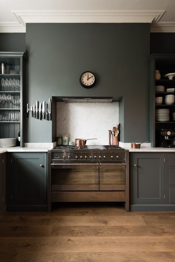 graphite grey kitchen with white countertops, metallic touches is a nice idea for a concept of a moody space
