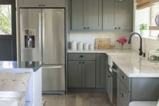 27 graphite grey vintage kitchen with white countertops and tiles looks peaceful and relaxed