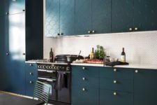 29 a teal kitchen with patterns, a penny tile backsplash and brass touches for a refined touch