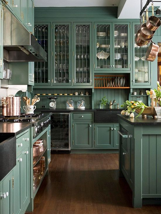 Victorian style kitchen done in analogous color theme looks refined and chic though a bit moody