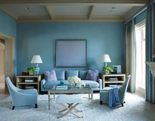 a blue space with grey as an additional color and light-colored ahy wood create a very relaxing ambience