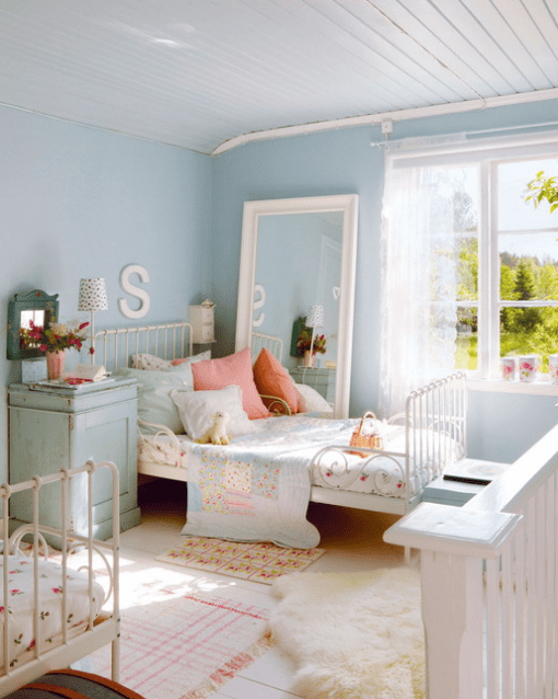 serenity blue is an ideal main color for a kids' room, soft pinks are additional, and white color polishes it all