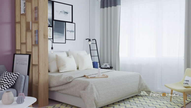 The sleeping space is taken by a large bed, wall sconces, a gallery wall and a ladder shelf for storage