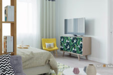 03 A colorful chair, a TV placed on a credenza with a banana leaf print and pastel textiles add a vivacious touch