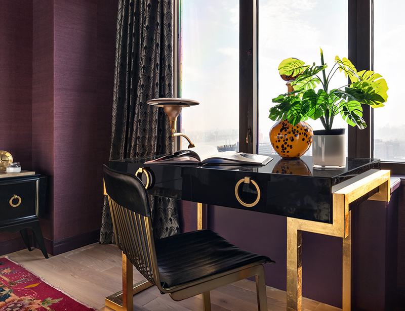 The black and gold geo desk is another eye catchy feature here, and the chair is matching