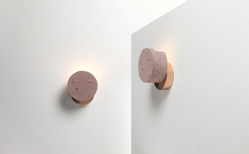 The wall version consists of two round volumes, a copper base attaches to the wall