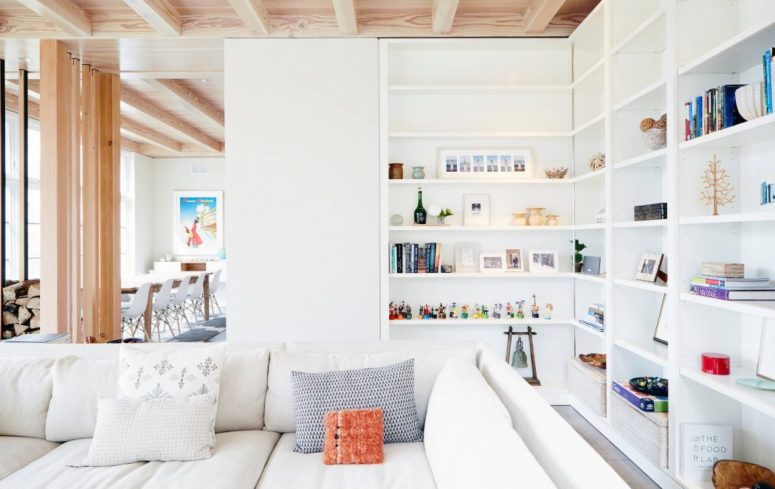 A large shelving unit is a great piece for storage, and as it's white it doesn't seem so large or bulky