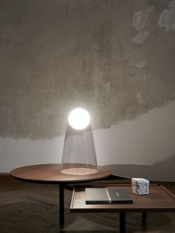 Satellight table lamp by Foscarini is sure to make a shining accent while having clear appearance