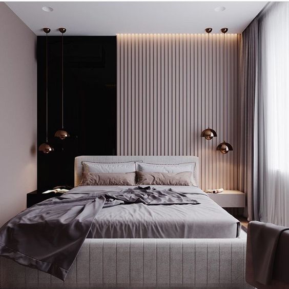a headboard wall with vertical wooden slats and a black part makes the space unique, and an upholstered bed makes it softer