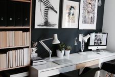 05 a Scandinavian home office with a black wall, a shelving unit and a shared white desk, bold artworks for cool wall decor