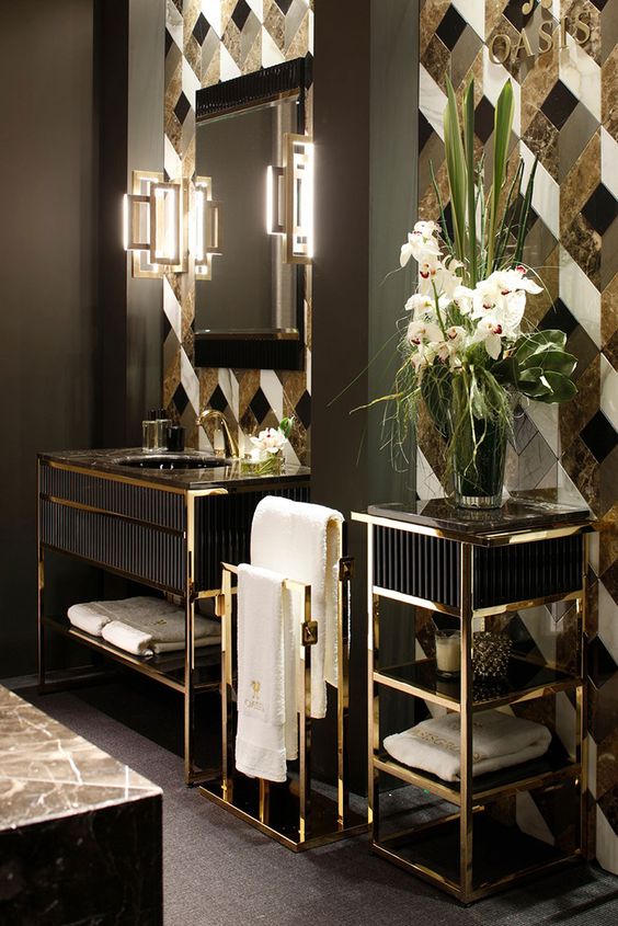gorgeous geometric black, grey, white and gold tiles with a marble print look very chic and refined