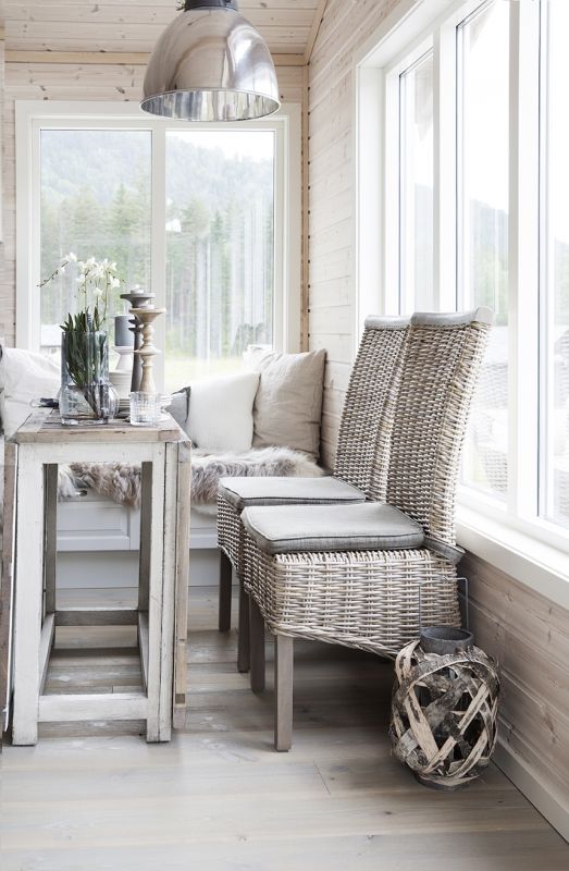 grey painted wicker chairs will make your sunroom more welcoming and look relaxing