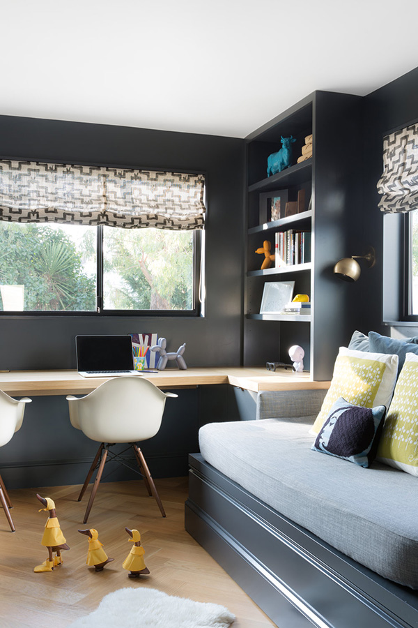 The home office is done in graphite grey, with a wall-mounted desk, it's a shared space, which is enough for two or more people