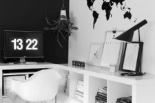07 a Scandinavian home office with a black statement wall and a white one with a world map decal looks bold