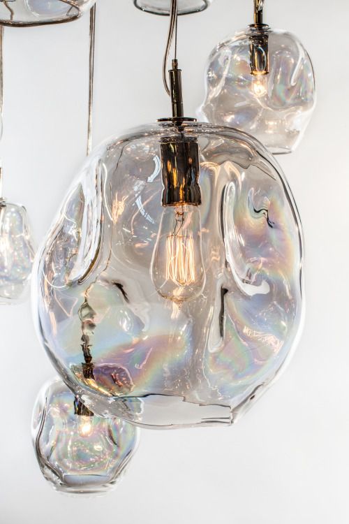 A unique transparent lamp of a very eye catching shape that shows imperfections at their best