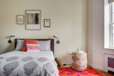 08 The master bedroom is a bright space with bold textiles, printed pillows and some cat retreats