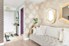 08 There are two types of wallpaper, a creamy velvet sofa and again brass touches to accentuate the space