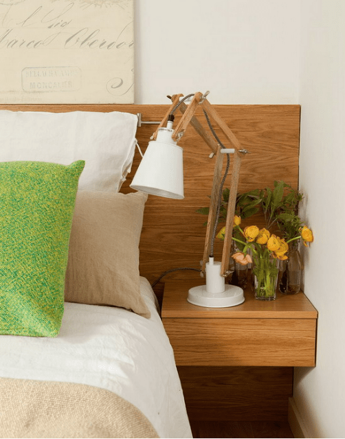 The headboard features floating nightstands that are suitable for some small stuff