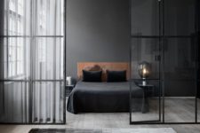 10 a sexy masculine bedroom with a black headboard wall and a leather upholstered bed for an eye-catchy look