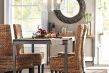 10 modern wicker chairs and an industrial table are great for a farmhouse dining space