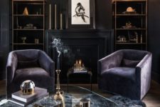 12 a luxurious dark living room with black walls, purple chairs, a grey faux fur rug and some brass touches for a chic look