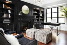 12 a luxurious space with white walls and a black one taken by cabinets, black chairs and a desk finish off the look