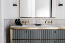 14 a corrugated metal vanity with brass touches looks very bold and interesting, art deco though modern