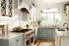 15 pastel blue and white ktichen in vintage farmhouse style, with a white kitchen island