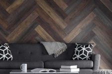 16 a modern space is made more eye-catching with weathered wood of various shades clad in a diagonal pattern