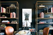 17 a chic shared home office with a statement black wall, an acrylic desk and brass touches