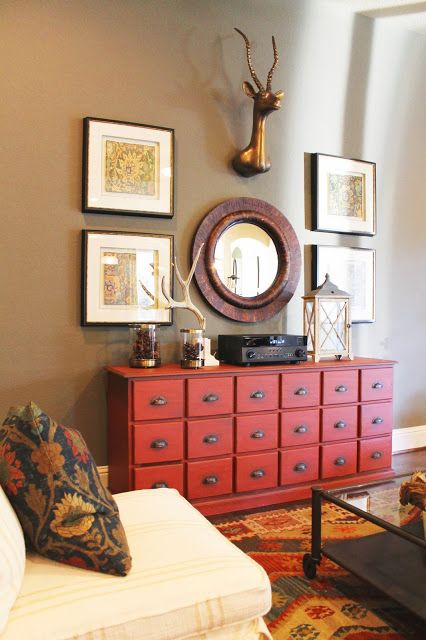to make the cabinet stand out, you can paint it in some bold shade, for example, red like here