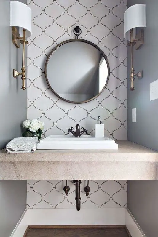 a Moroccan tile accent wall highlights the sink zone. and metallic accents make it bolder