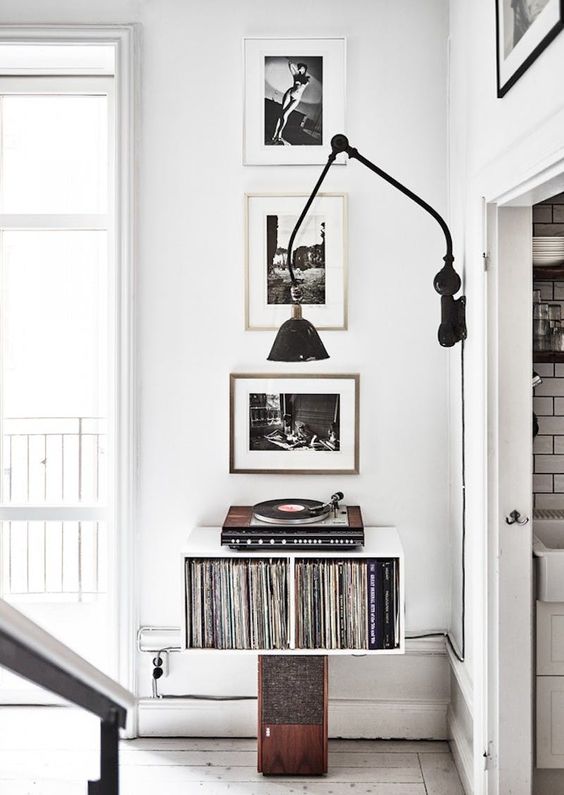 A small nook used for storing vinyl and for playing it too   only for melomans and vintage lovers