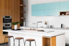 19 a white and light blue kitchen looks modern and refreshing, and natural wood touches make it cozier
