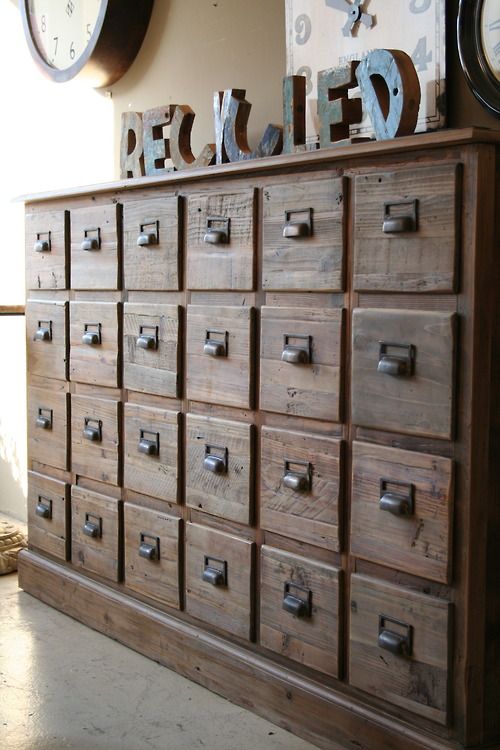 a wooden apothecary cabinet is great for a vintage or rustic space