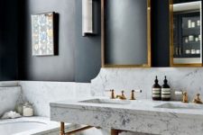21 black walls and white marble for a bold modern space, and brass touches to make it more glam