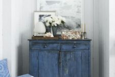 22 a colorful shabby chic cabinet is another great idea for storage in an awkward corner