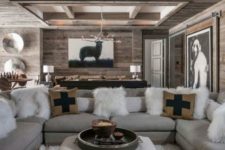 22 exposed wooden beams and a reclaimed wooden wall makes the space feel comfortable and rural