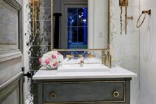 23 a greyish blue vanity with a marble top looks very cool and chic