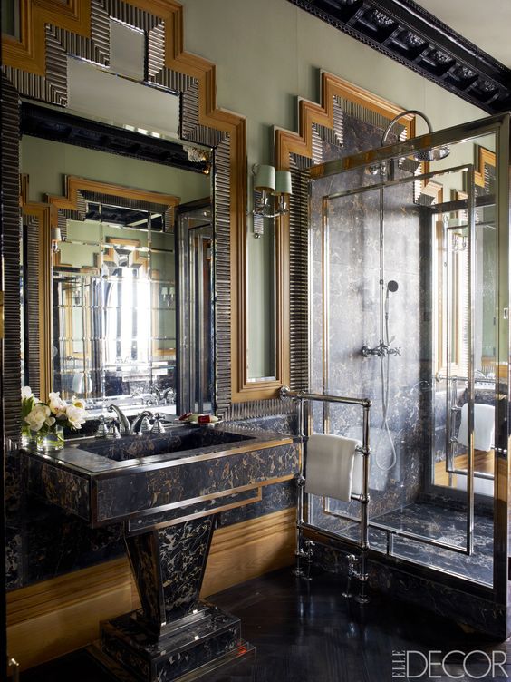 creative panels on the walls and floor, silver details and brass touches to make the room cool