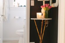24 a tiny side table with a candle, lamp and soem fresh blooms on metallic legs is ideal for a tiny corner