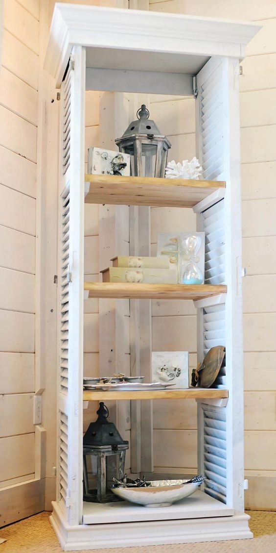 window shutters turned into a comfy shelving unit is great for any farmhouse space