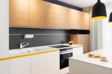 27 a modern kitchen with white and light-colored wooden cabinets and some black touches for an eye-catchy look