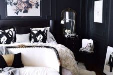 27 a refined space with black panel walls and creamy furniture looks wow, and vintage details make it gorgeous