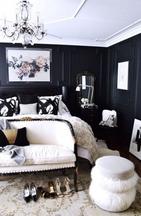 a refined space with black panel walls and creamy furniture looks wow, and vintage details make it gorgeous
