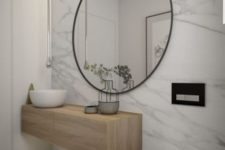 28 a white marble wall makes a luxurious and cool accent in the space