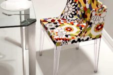 01 Pizzaro dining chair is a floral piece with acrylic legs and frame and is inspired by 1960s