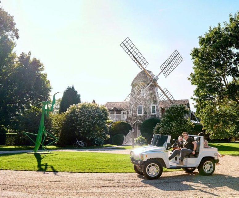 The Windmill House with a 15 foot praying mantis statue on the front lawn