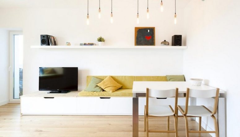 This chic apartment was done in minimalist style, with an airy feel and colorful touches